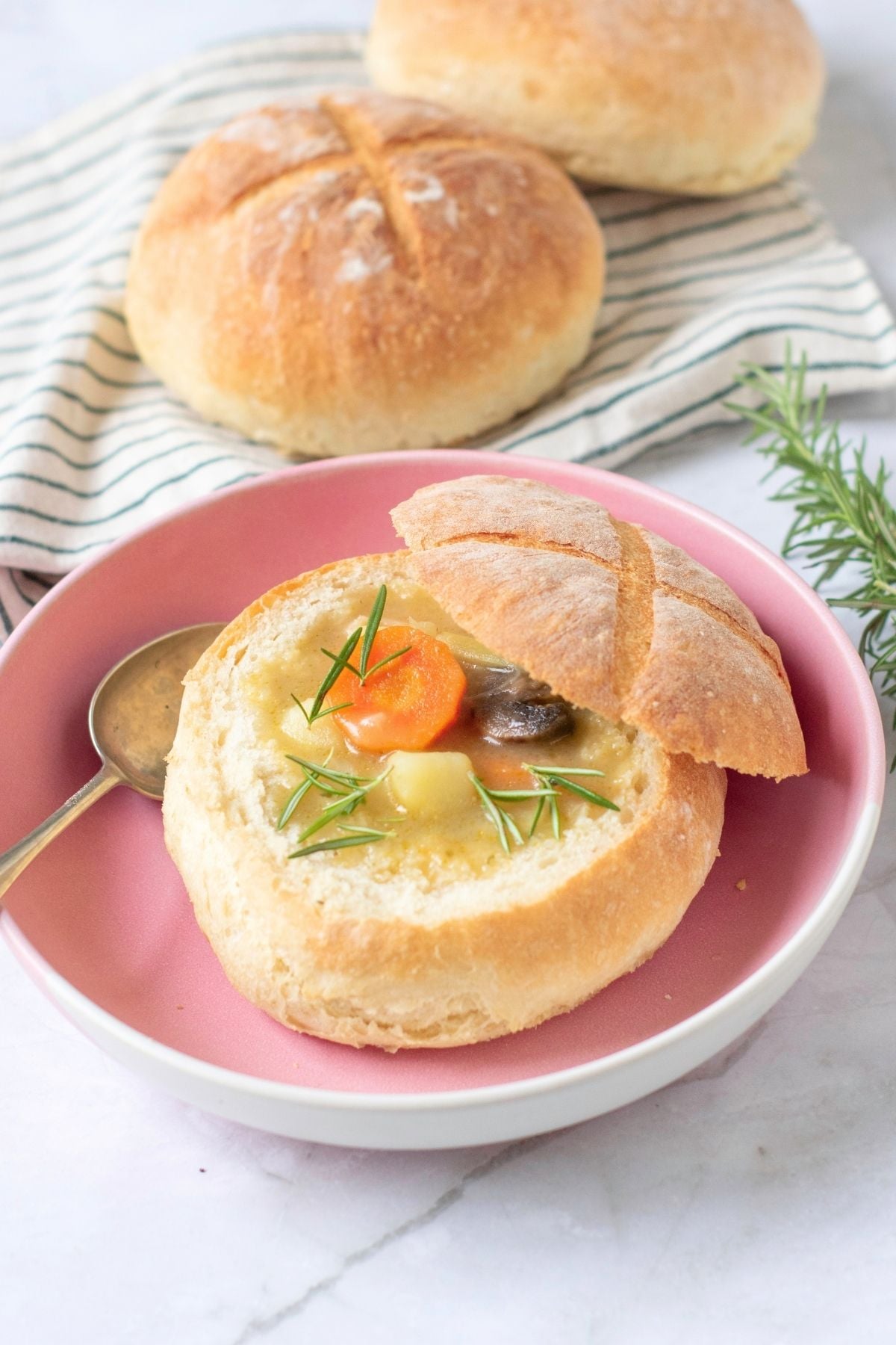 Quick homemade bread bowl filled with soup.