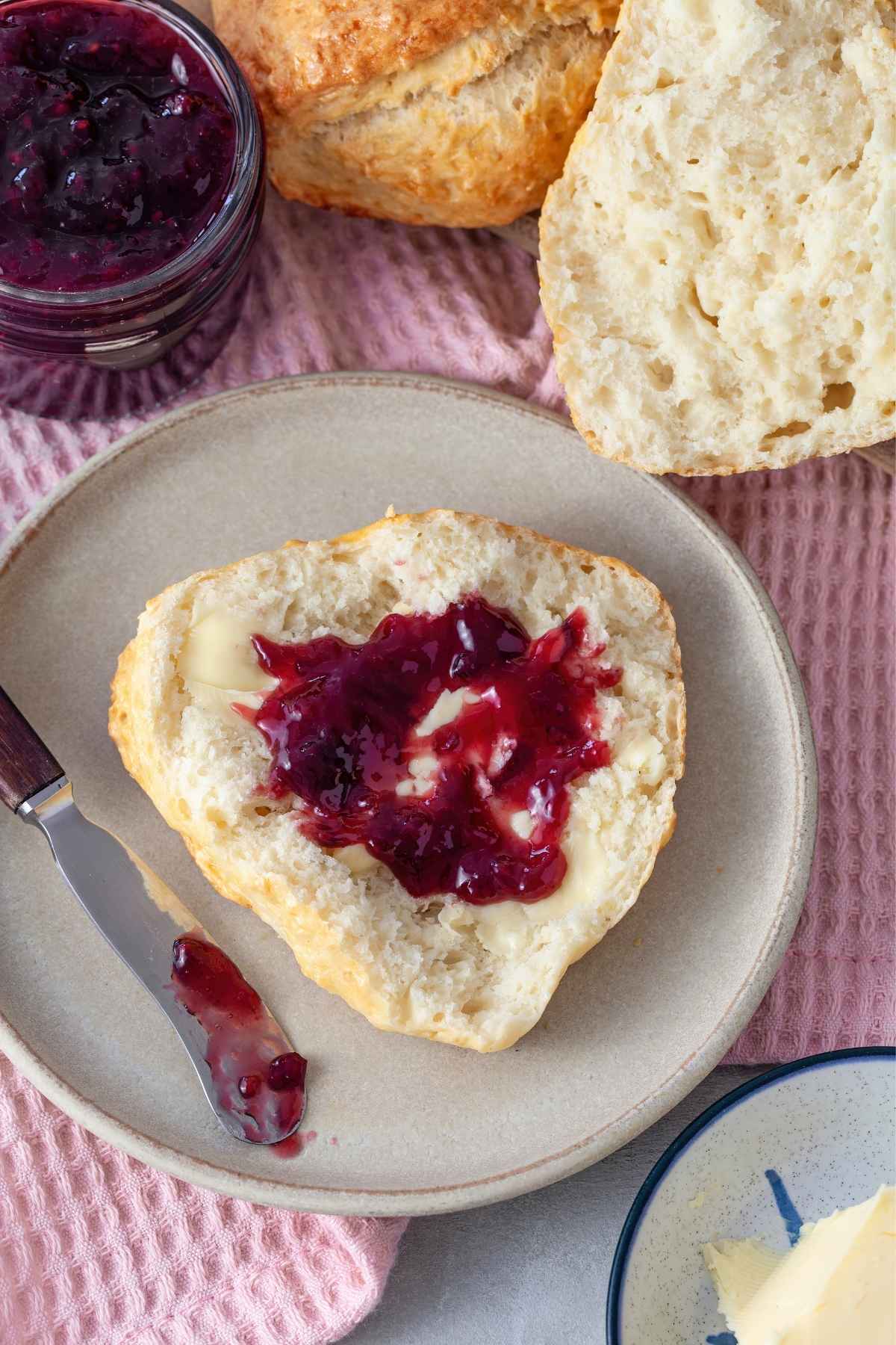 Kefir bread slice with butter and jam.