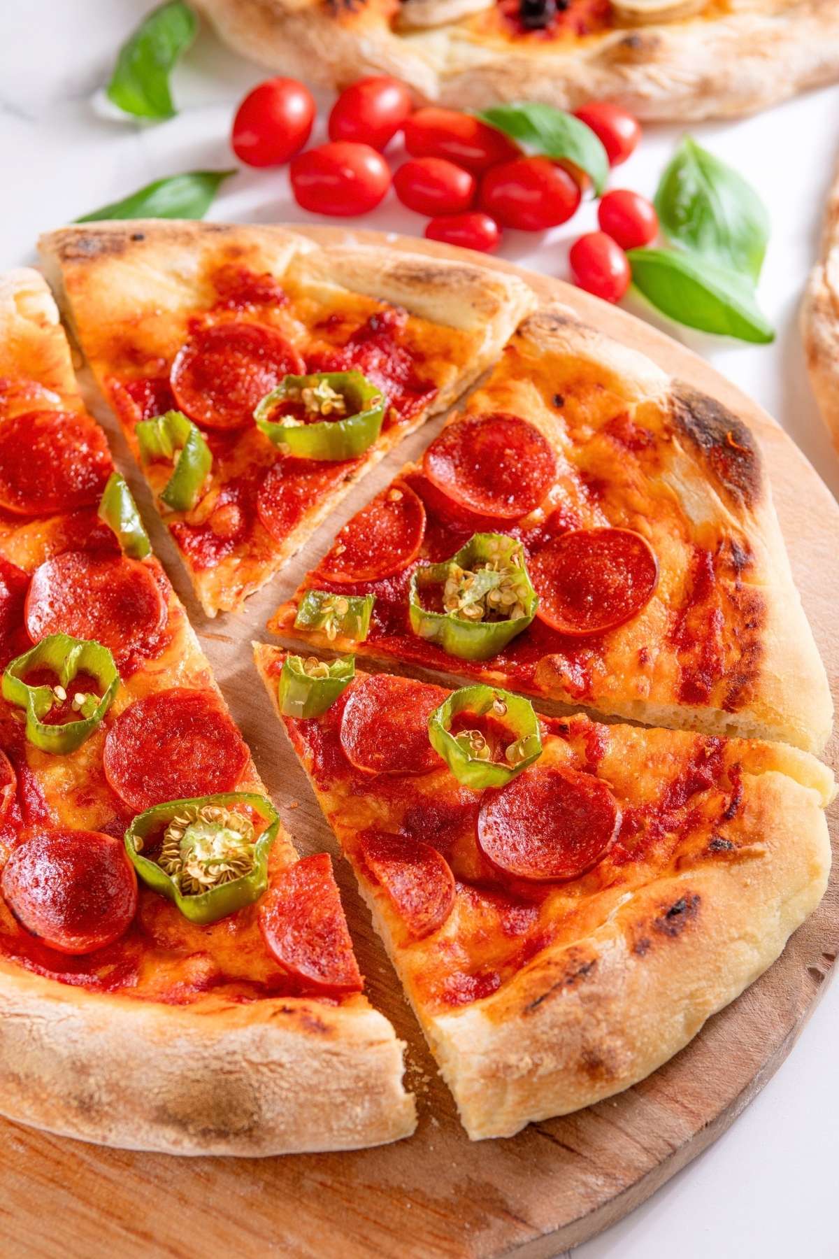 Pepperoni and jalapeño pizza slices.