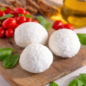 Fresh mozzarella balls with tomatoes and basil.