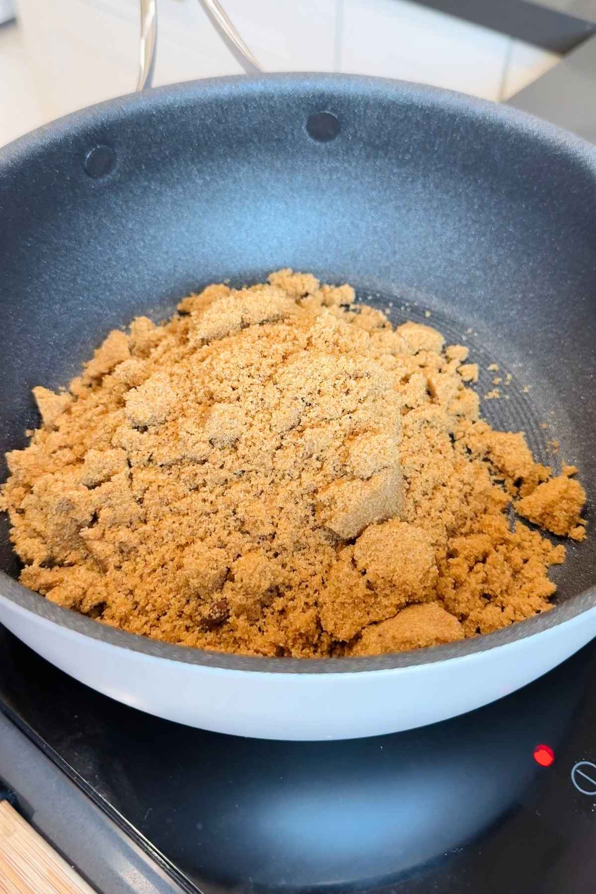 Brown sugar in a saucepan.