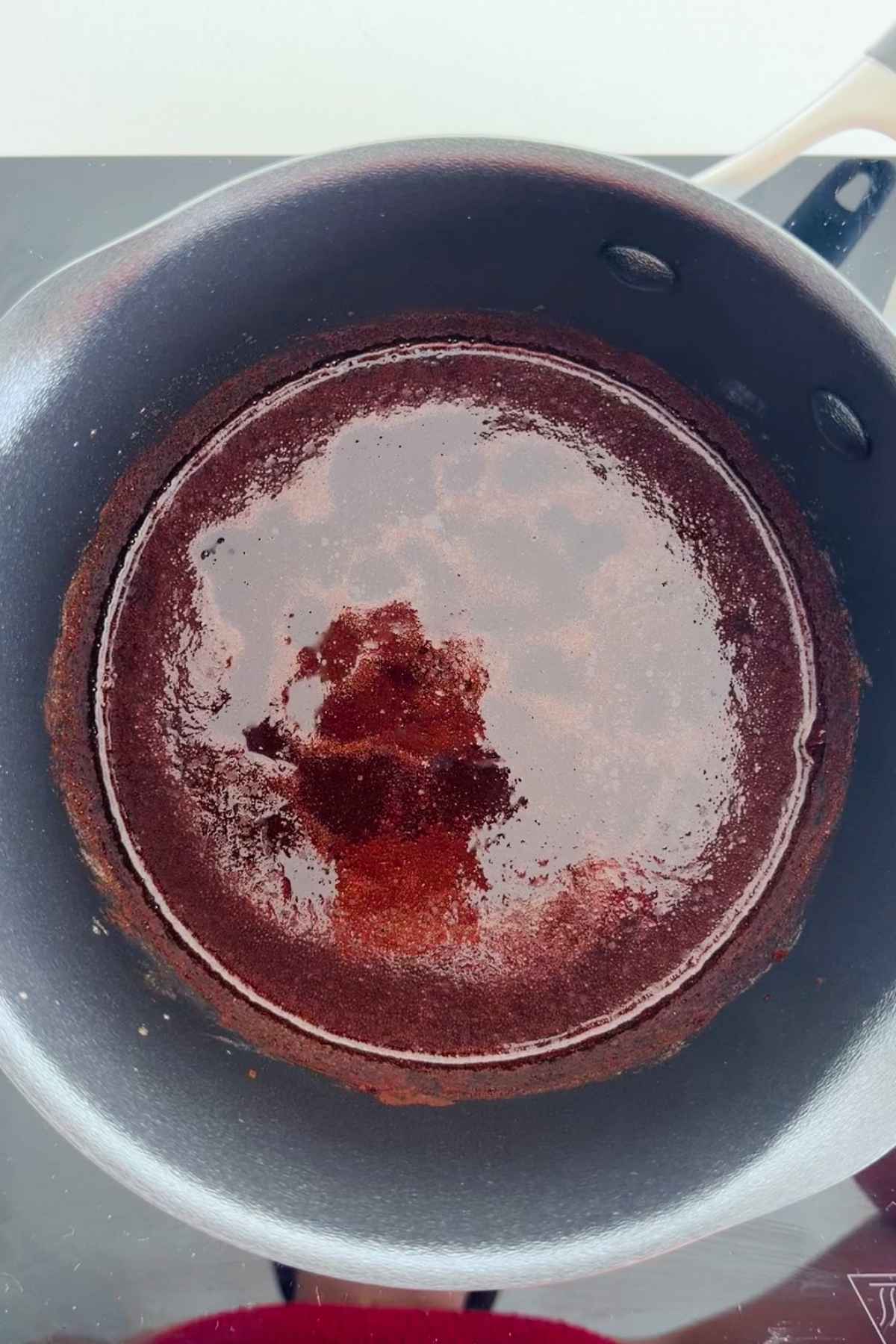 Homemade cosmic brownie batter in pan.