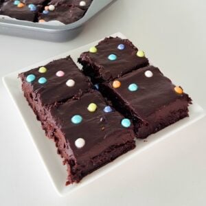 Homemade cosmic brownies with colorful candy dots.